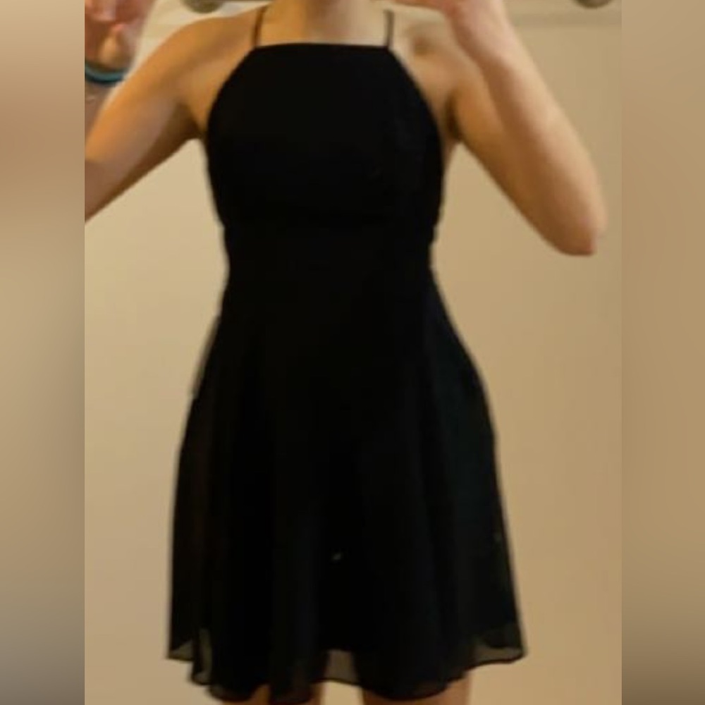 Black lulus formal/skater dress. OPEN BACK. Great quality. Worn once